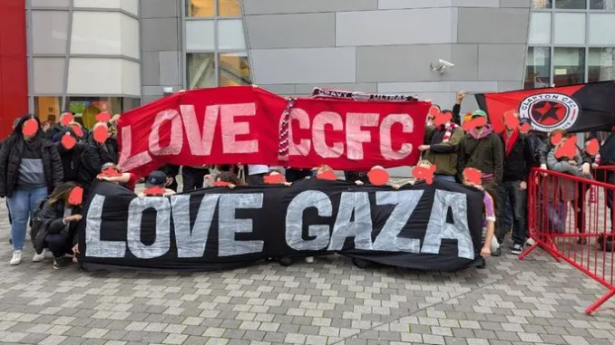 Clapton fans expelled for “offensive” banners